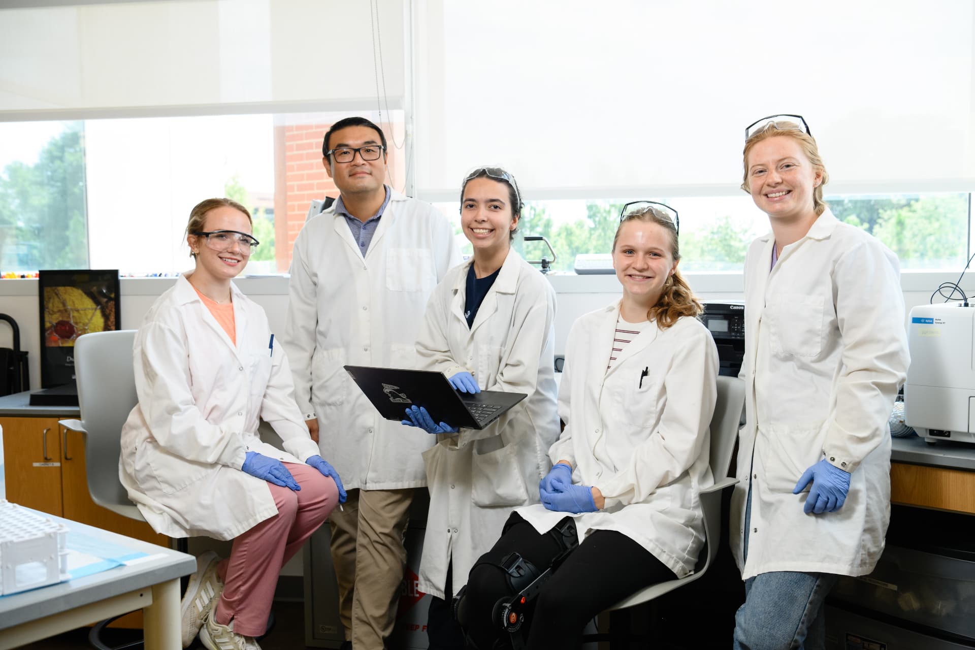Dou Lab team in lab coats
